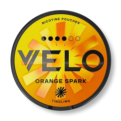 Velo Orange Spark Slim nicotine pouch can. Orange and white design, all white slim pouch with vibrant orange flavor. Fresh and zesty.