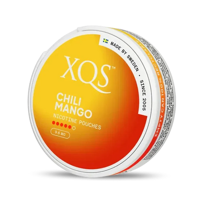 Close-up of XQS Chili Mango all white nicotine pouch can. Slim format, chili mango taste, modern vibrant packaging.