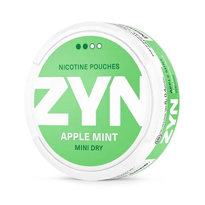 ZYN Apple Mint Mini Dry nicotine pouch can. Green and white design, all white mini pouch with dry apple and mint flavor. Discreet and fresh.